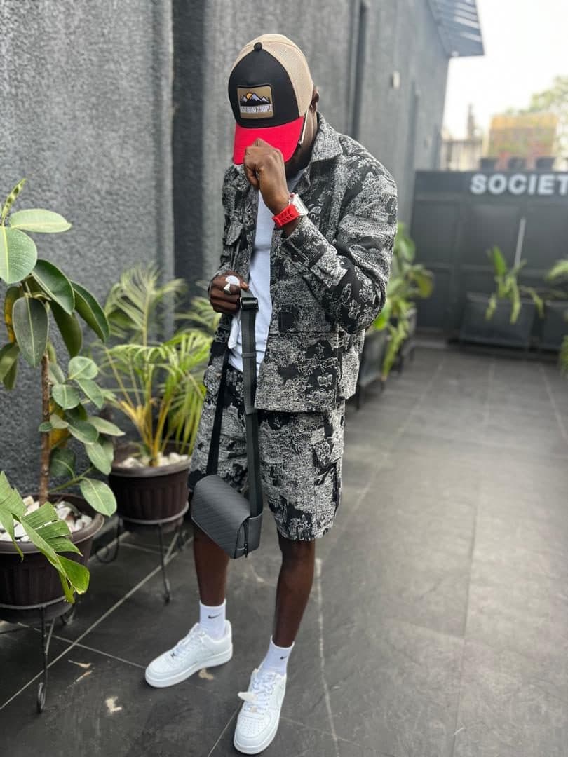 Grey camouflage shirt and shorts set with white trainers
